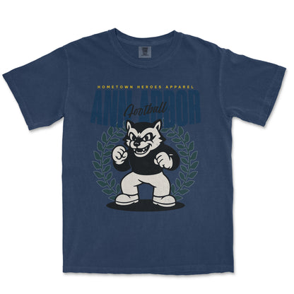 Navy blue t-shirt with a graphic of a mascot and text on a white background