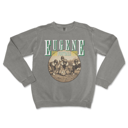 Gray sweatshirt with 'Eugene Football' graphic on a white background