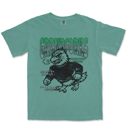 Teal t-shirt with graphic design and text on a white background