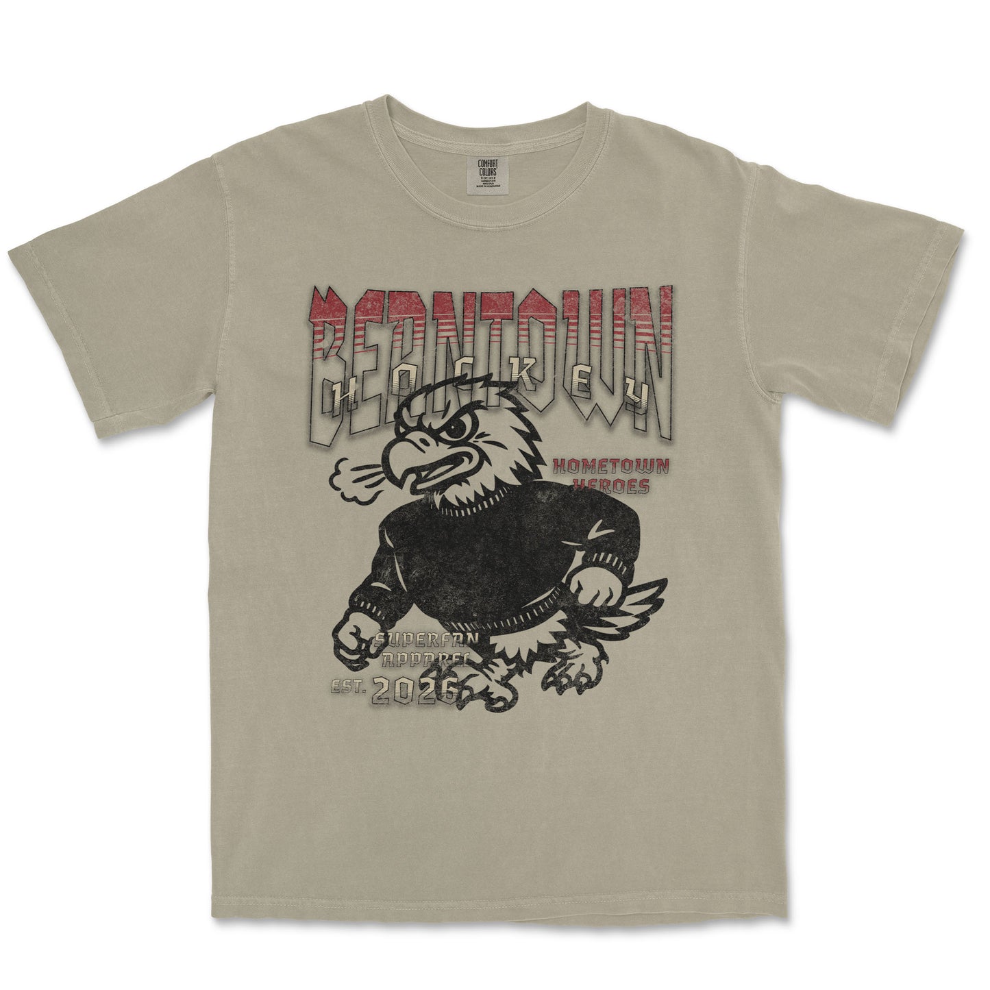 Beige t-shirt with an eagle graphic and text on a white background