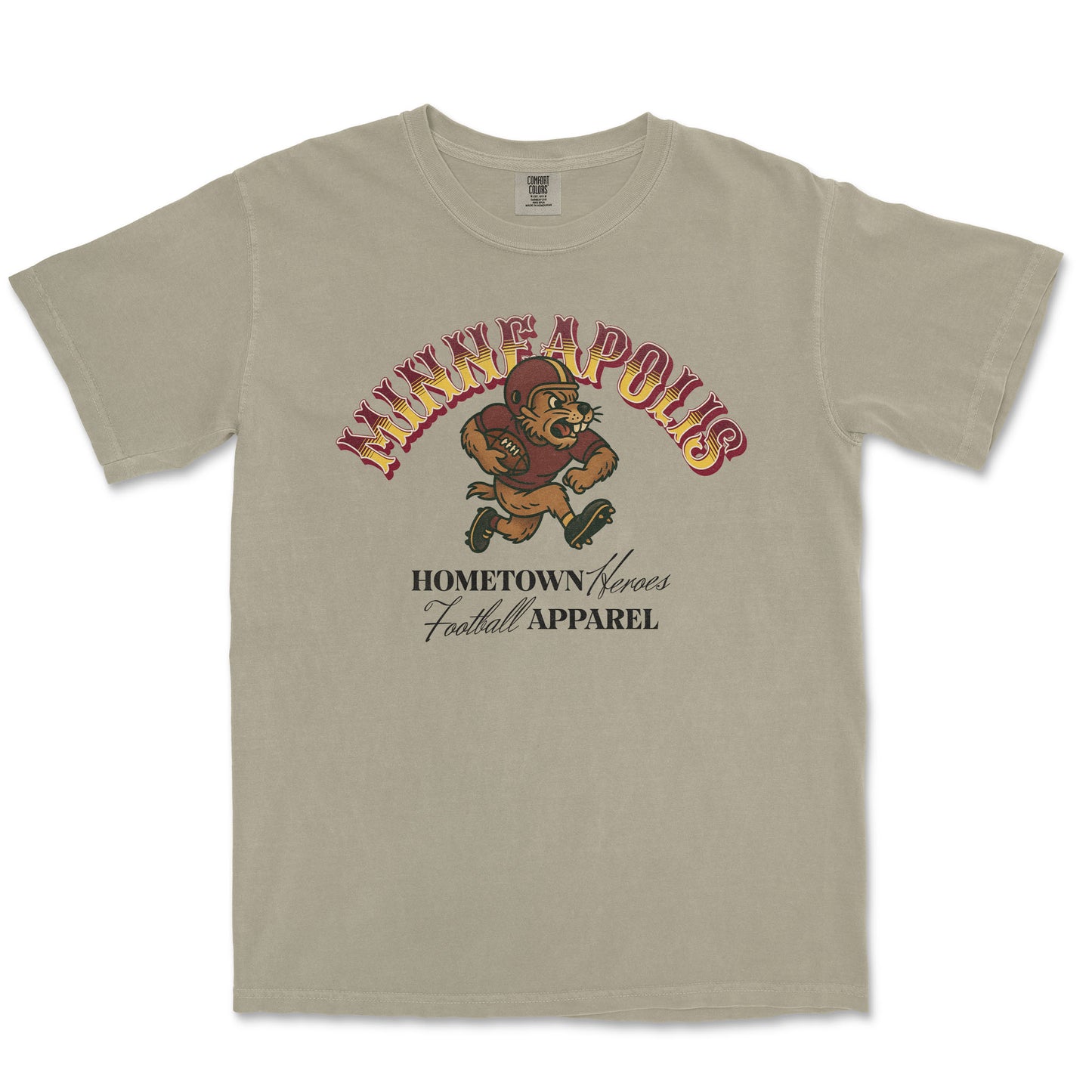 Beige t-shirt with 'Minneapolis' and football graphic on a white background