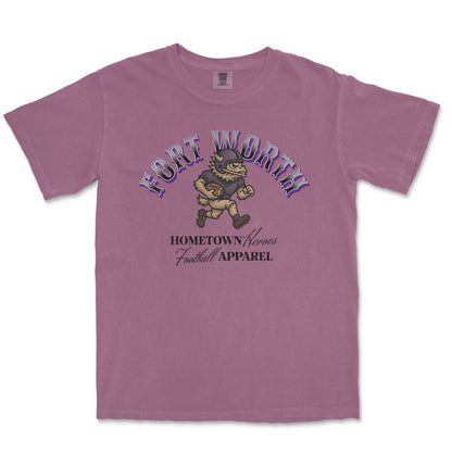 Pink t-shirt with 'Fort Worth' and football-themed graphic on a white background