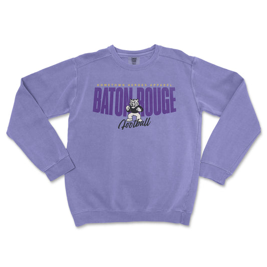 Purple sweatshirt with 'Baton Rouge Football' text and logo on a white background