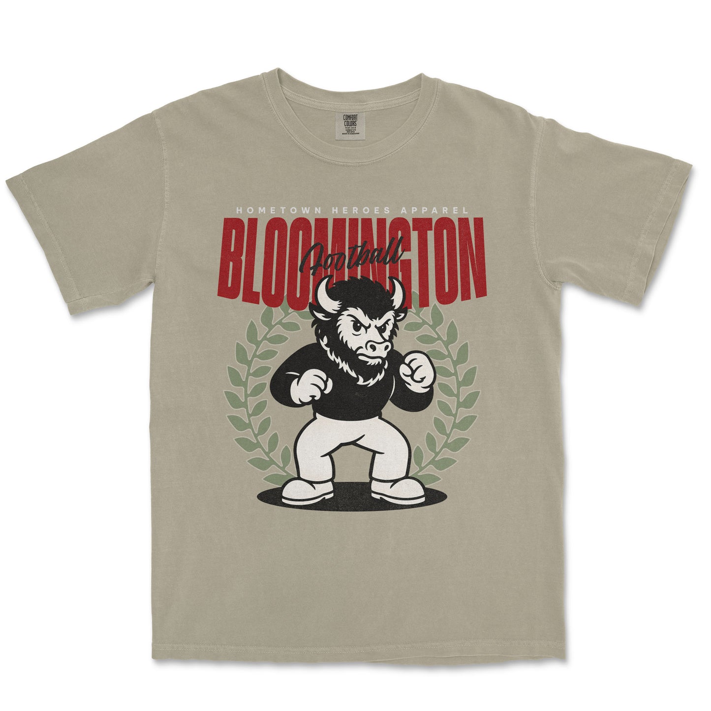 Beige t-shirt with a graphic of a bull and text 'Bloomington' on a white background