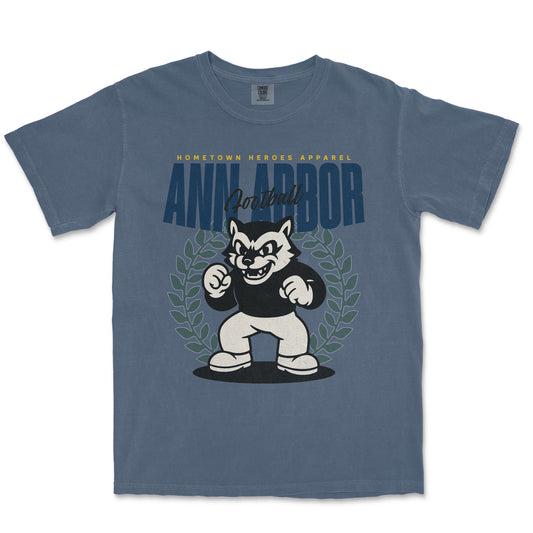 Blue t-shirt with a cartoon bear graphic and 'Ann Arbor' text on a white background