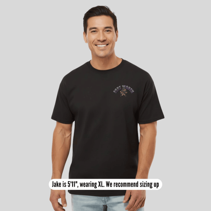 Man wearing a black t-shirt with a logo on a gray background