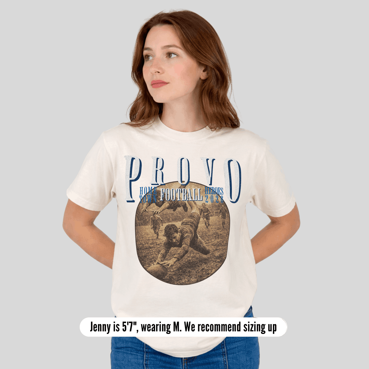 Woman wearing a white t-shirt with 'PROVO' and football graphic on a plain background