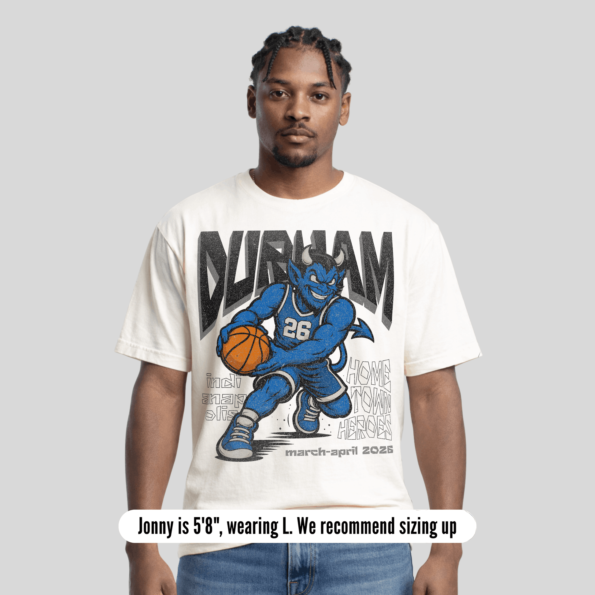 Man wearing a 'Durham' t-shirt with a graphic design on a gray background