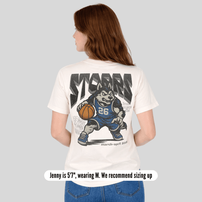 Person wearing a white t-shirt with a graphic design on the back, standing against a plain background.